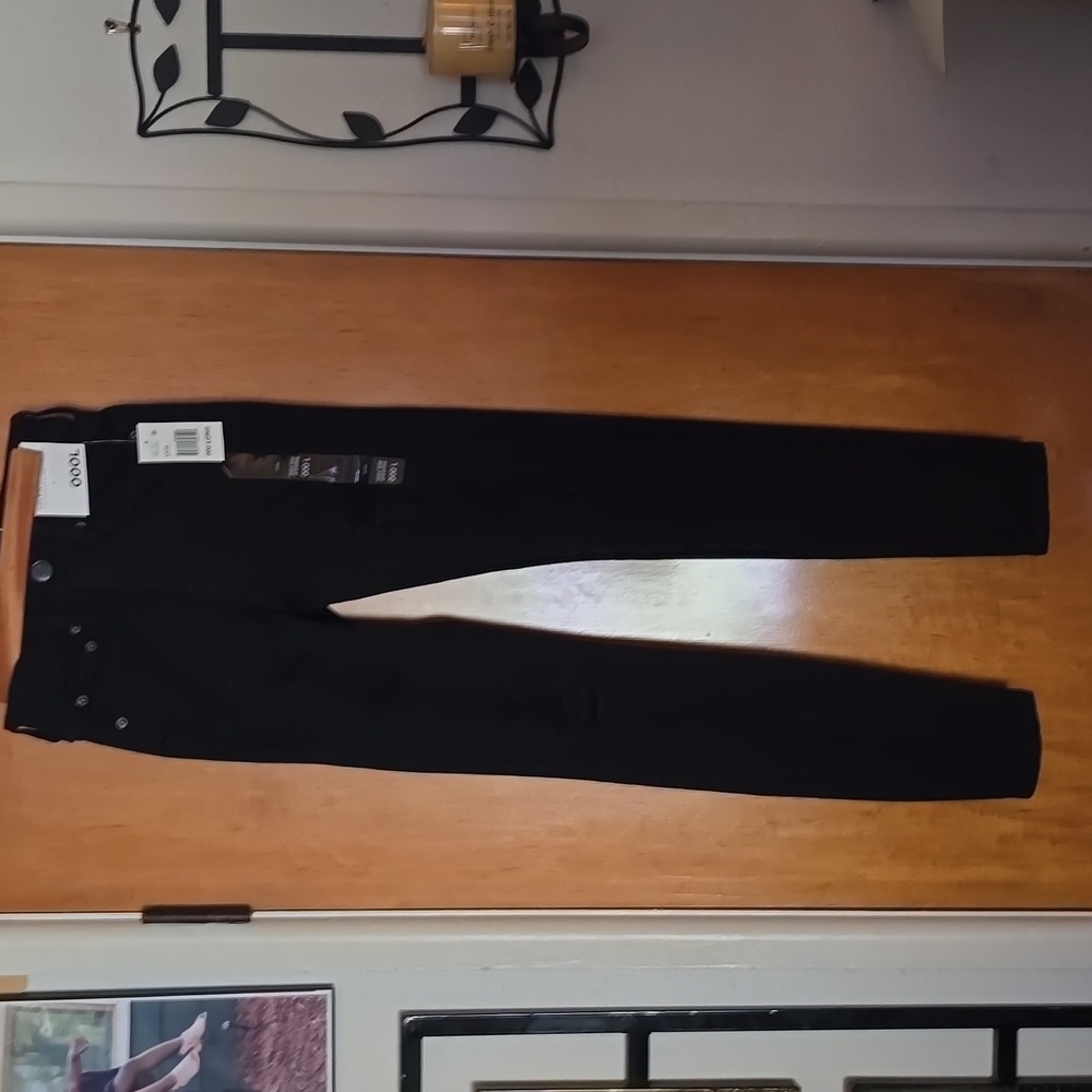 Aero black high rise skinny jeans.
